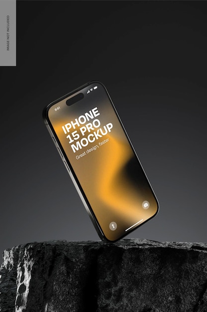 Iphone 15 pro en una maqueta de roca cayendo