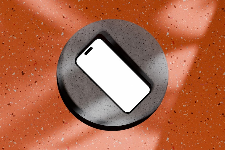 PSD iphone 16 mockup en hormigón con superficie y sombra naranja
