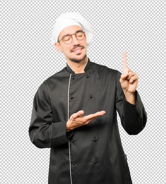 Jeune chef faisant un geste numéro un