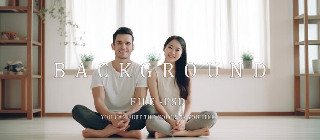 PSD un jeune couple romantique heureux assis sur le sol à la maison.