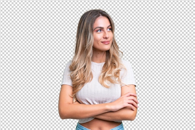 Jeune femme uruguayenne sur le fond isolé regardant le côté