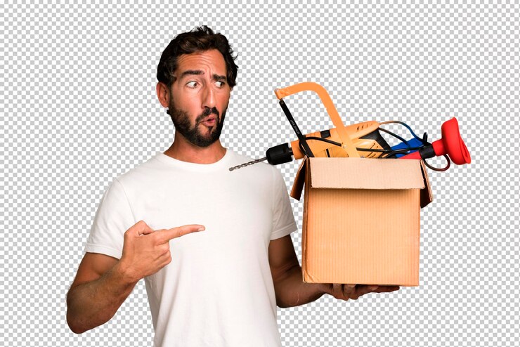 PSD jeune homme barbu et expressif fou avec un concept de bricoleur de boîte à outils