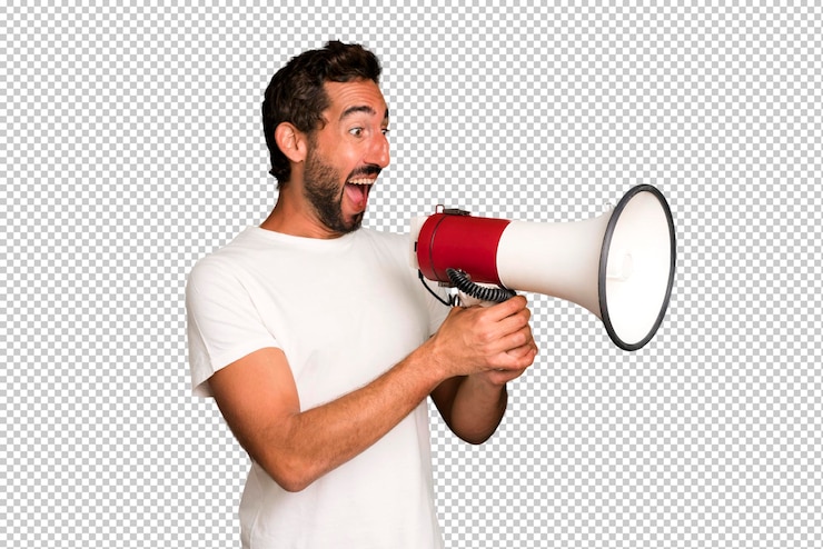 PSD jeune homme barbu fou et expressif utilisant un mégaphone pour dire un message