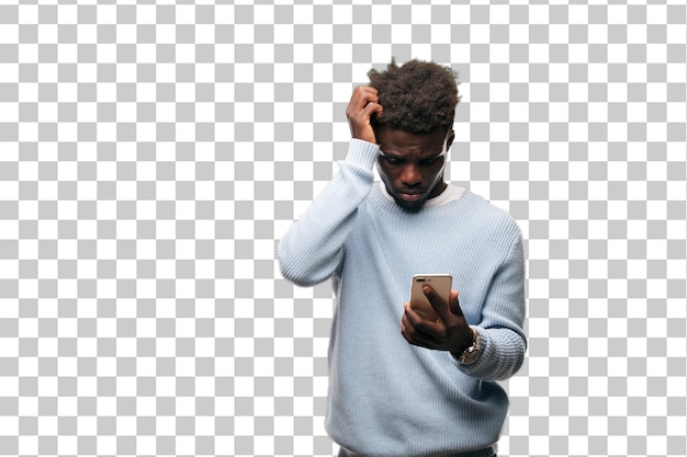 PSD jeune homme noir à l'aide d'un téléphone mobile intelligent