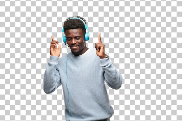 Jeune homme noir écoute de la musique avec ses écouteurs