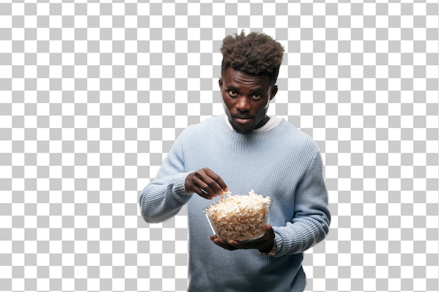 Jeune Homme Noir Avec Des Grains De Pop. Concept De Cinéma