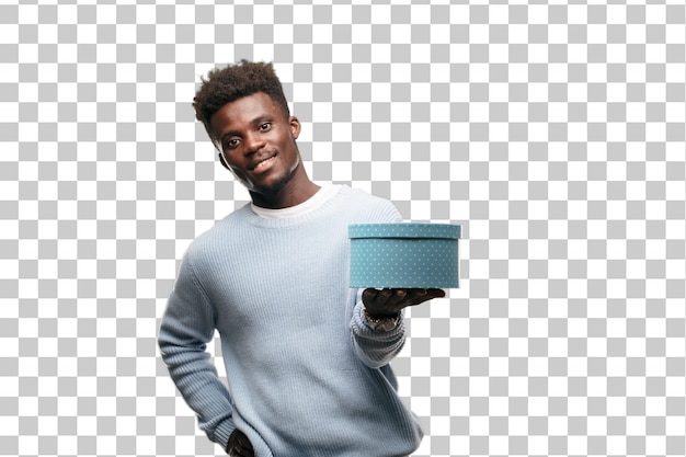 Jeune homme noir tenant une boîte-cadeau