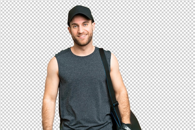 Jeune homme sportif avec un sac sportif sur un fond de clé chrome isolé riant
