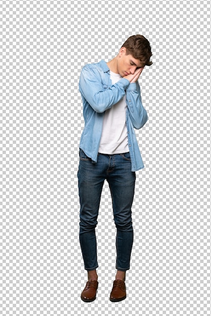 Jovem bonito fazendo gesto de sono na expressão dorable