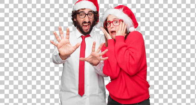 Jovem casal expressando o conceito de natal. casal e plano de fundo em diferentes camadas