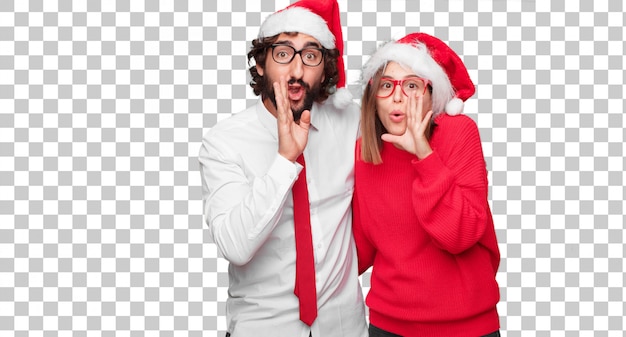 Jovem casal expressando o conceito de natal. casal e plano de fundo em diferentes camadas