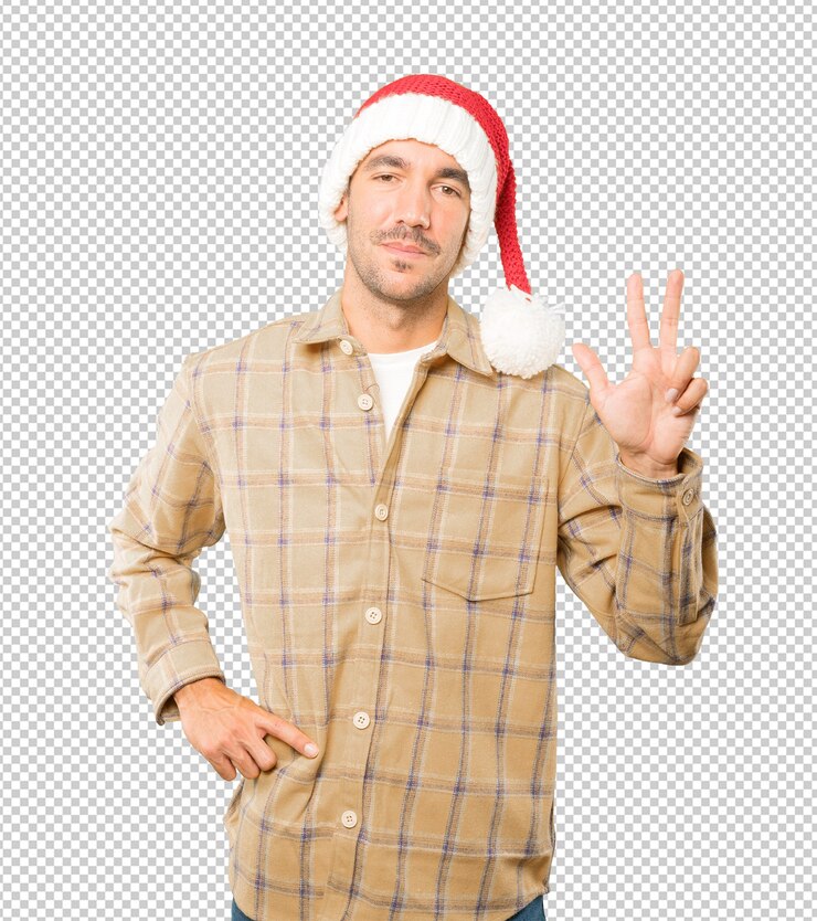 PSD jovem com um chapéu de natal enquanto gesticula isolado