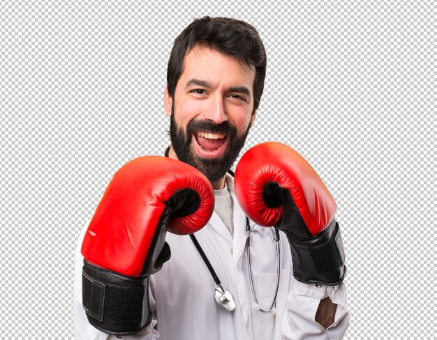 Jovem médico com luvas de boxe