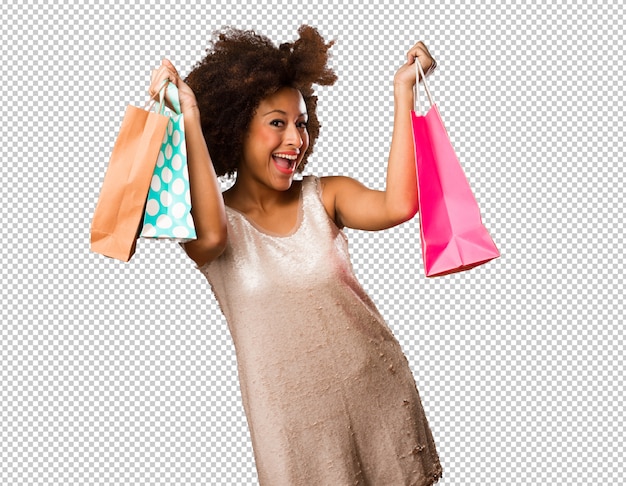 Jovem negra segurando sacolas de compras