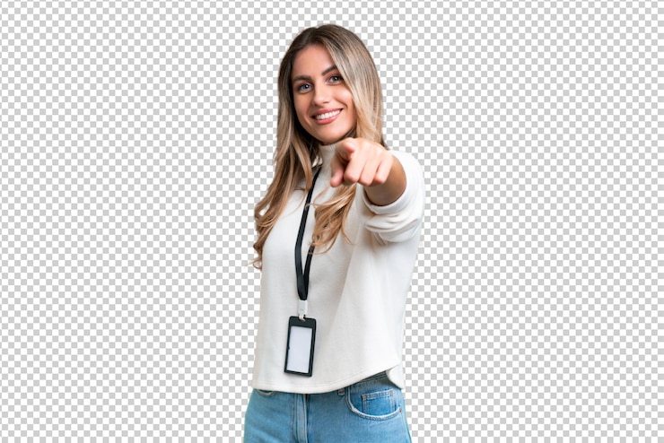 PSD jovem uruguaia com carteira de identidade sobre fundo isolado, apontando para a frente com expressão feliz