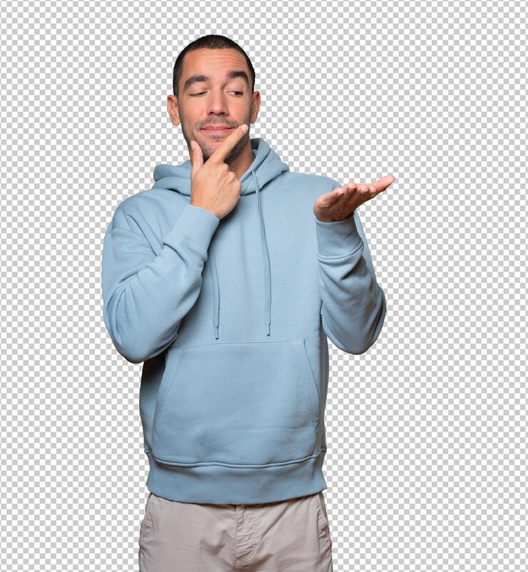 PSD joven dudoso sosteniendo algo con la mano