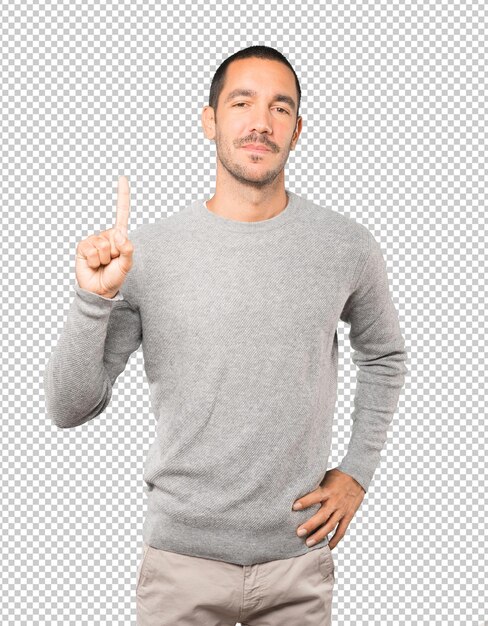 Joven haciendo un gesto de número uno