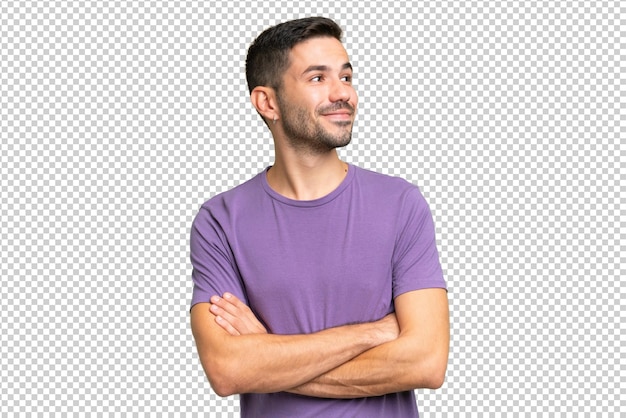 Joven hombre caucásico guapo sobre fondo aislado feliz y sonriente