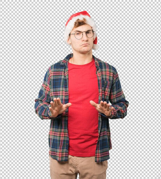 Joven en Navidad haciendo gestos