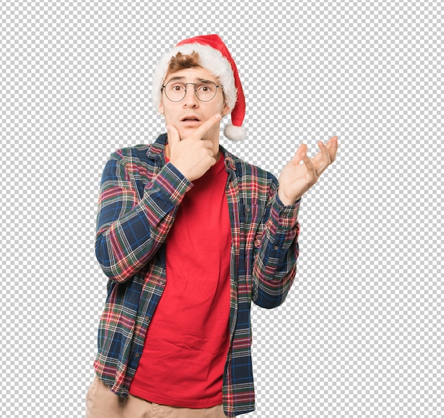Joven en Navidad haciendo gestos