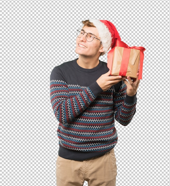 Joven en Navidad haciendo gestos