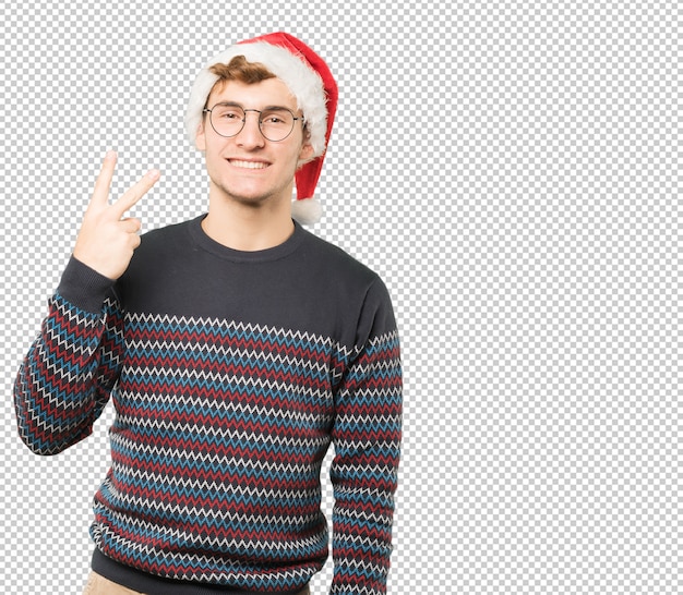 Joven en Navidad haciendo gestos
