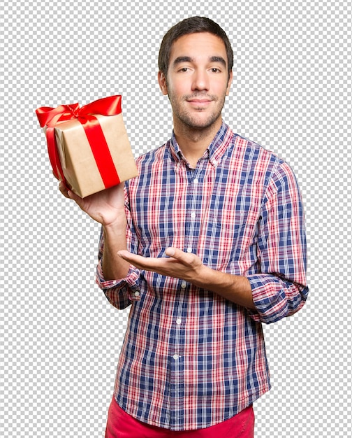 Joven de navidad sujetando un regalo