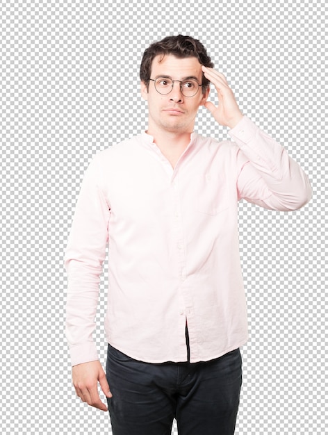 Joven preocupado haciendo un gesto de alivio
