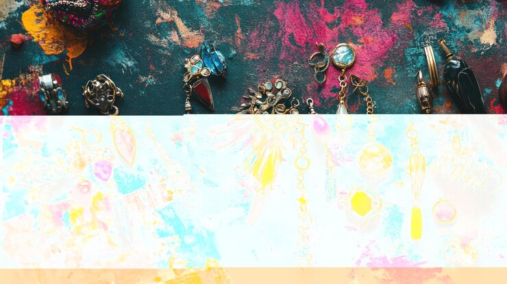 PSD joyas coloridas hechas a mano esparcidas sobre una superficie pintada