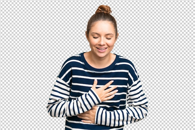 Junge blonde Frau über isolierter Chroma-Schlüssel-Hintergrund, die viel lächelt