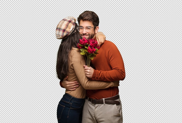Junge Paare am Valentinsgrußtag, der eine Umarmung gibt