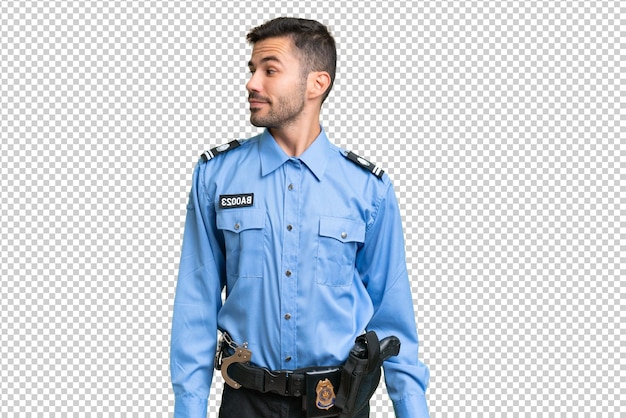 PSD junge polizist, kaukasischer mann über isolierter hintergrund, der zur seite schaut