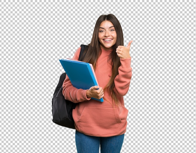 Junge Studentenfrau, welche die Notizbücher zeigen okayzeichen und Daumen herauf Geste hält