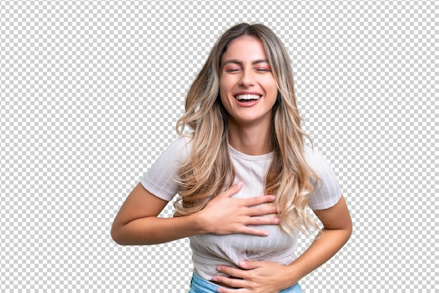 Junge uruguayische Frau über isolierten Hintergrund viel lächelnd