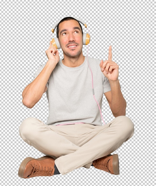 PSD junger mann in sitzender position mit einer fingerzeiggeste