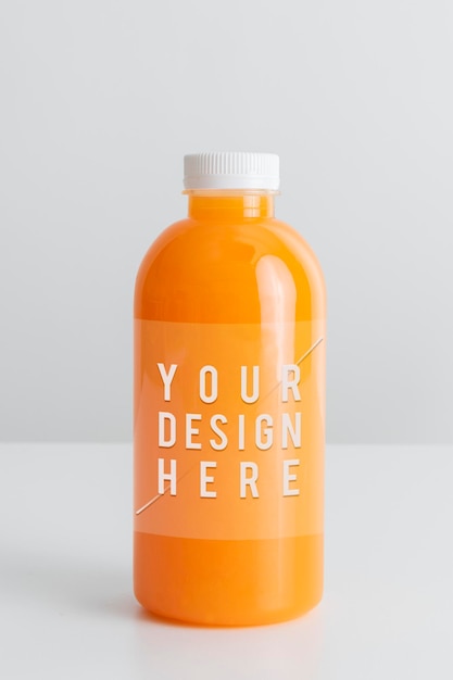 PSD jus d'orange bio frais dans une maquette de bouteille