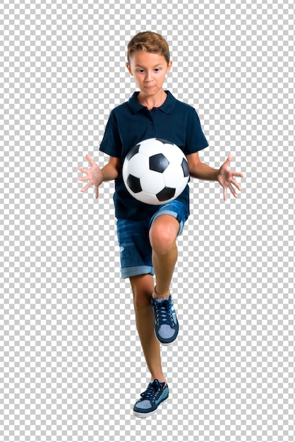 Kleinkind, das Fußball spielt