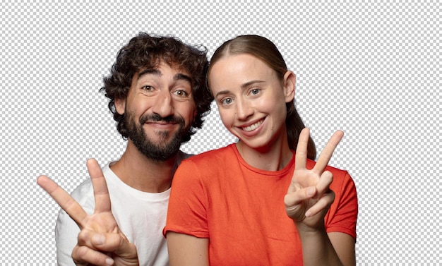 lächelnd und glücklich aussehend, sorglos und positiv, mit einer Hand Sieg oder Frieden gestalten