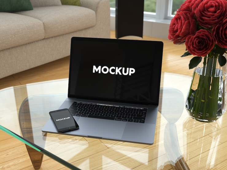 PSD laptop and mobile phone on glass table mock up design