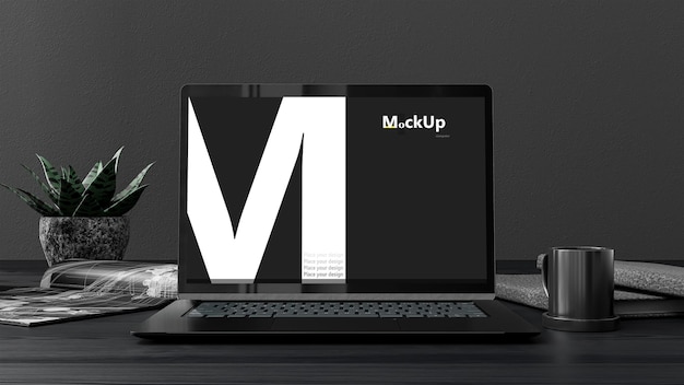 Laptop MockUp color negro en el escritorio con cuaderno y taza de café Diseñado en tono oscuro