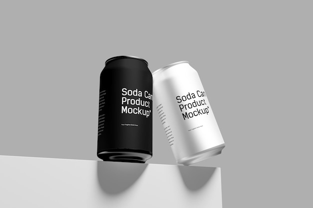 una lata de soda y una lata blanca de soda