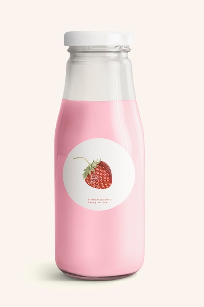 Latte di fragole fresco in bottiglia di vetro con un modello di etichetta