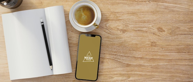 Leeres notizbuch mit smartphone-leerbildschirm-mockup-kaffeekopierraum auf holztisch