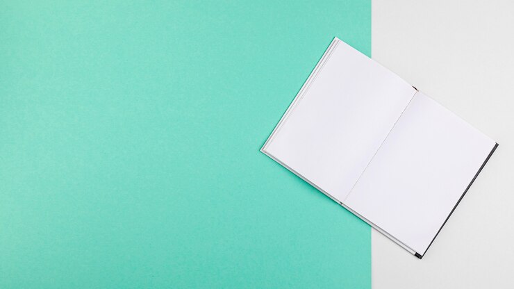PSD libro abierto sobre fondo azul copia espacio