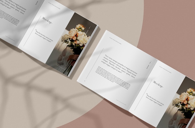 Libro aperto di vista superiore con il modello editoriale della rivista delle ombre
