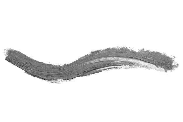 Ligne grise et tache dessinée au crayon sur un fond vide