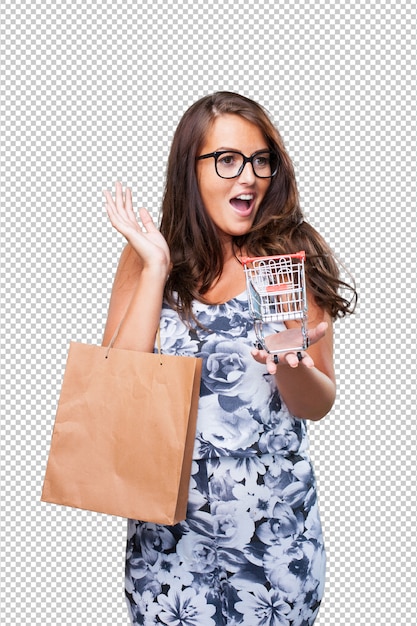 Linda mujer sosteniendo un carrito de compras