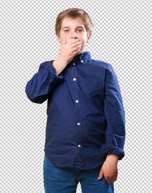 Little boy yawning on white