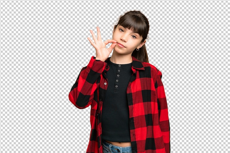 PSD little girl over isolated green chroma key background showing a sign of silence gesture