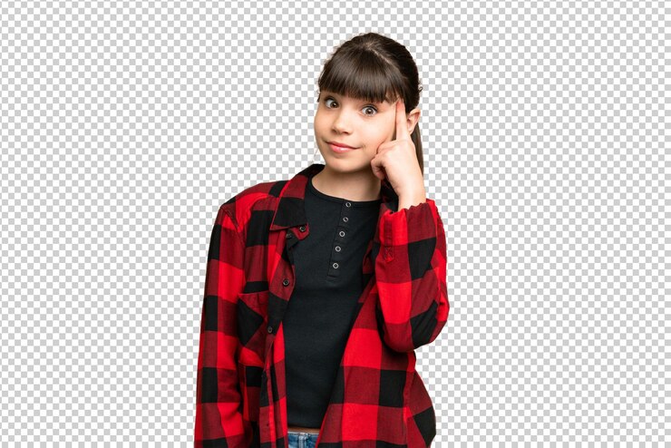 PSD little girl over isolated green chroma key background thinking an idea